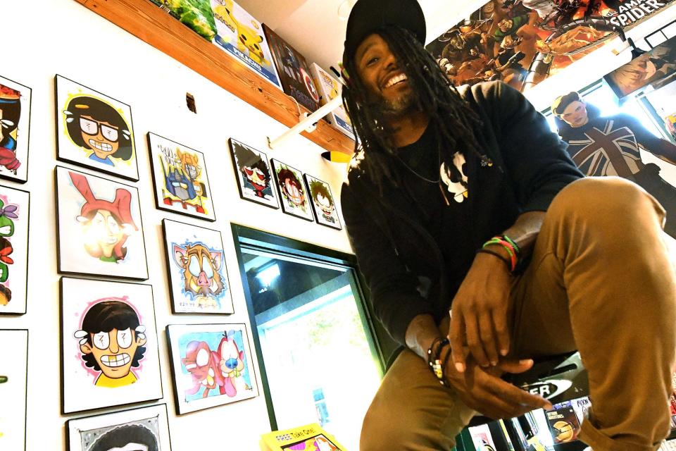 Wilmington artist HP Fangs/Haji Pajamas/Greyson Davis at Memory Lane Comics, in downtown Wilmington, N.C. April 27, 2022. Davis is a regular and has displayed his work there for years.