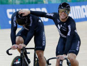 Cycling - UCI Track World Championships - Men's Team Sprint, Final - Hong Kong, China - 12/4/17 - New Zealand's Ethan Mitchell celebrates with Edward Dawkins. REUTERS/Bobby Yip