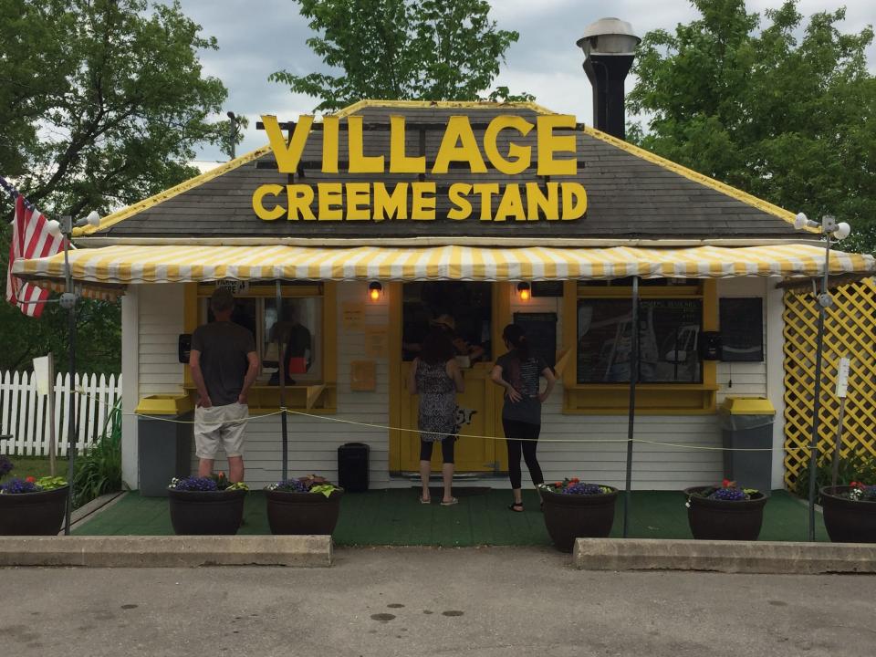 Customers order creemes at Bristol's Village Creeme Stand.