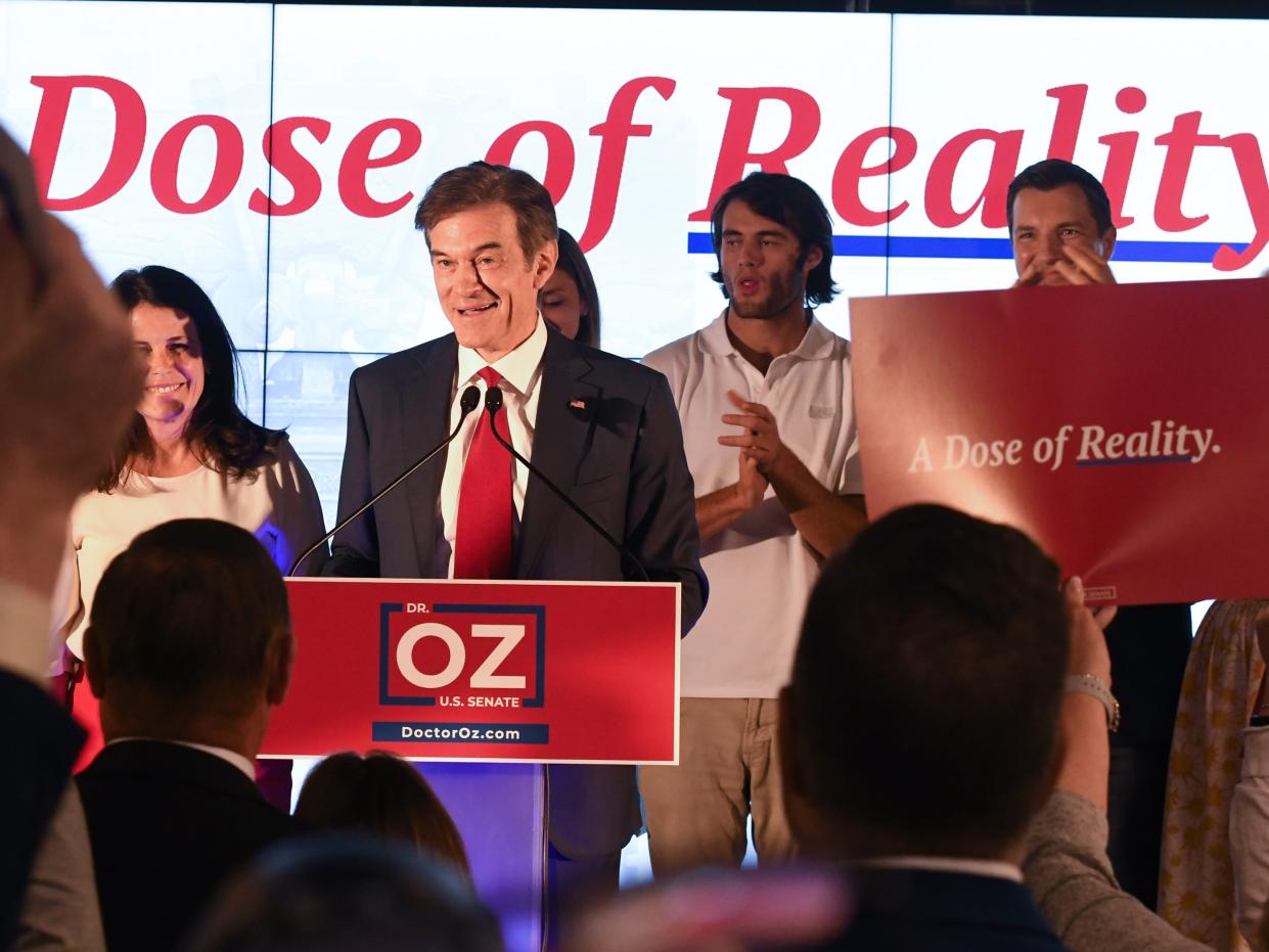 NEWTOWN, PA - MAY 17: Republican U.S. Senate candidate Mehmet Oz greets supporters after the primary race resulted in an automatic re-count due to close results on May 17, 2022 in Newtown, Pennsylvania. Television personality Oz, endorsed by former President Donald Trump, finished in a virtual dead heat with former George W. Bush administration official Dave McCormick with 95 percent of the vote reported. (Photo by Stephanie Keith/Getty Images)