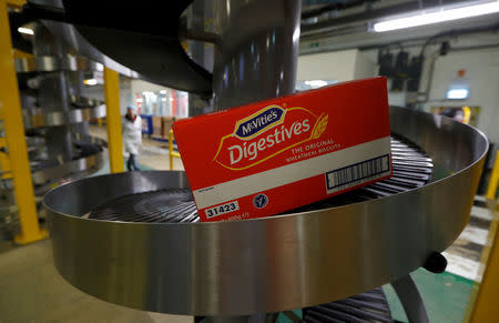 A box of biscuits is transported along the production line at Pladis' McVities factory in London Britain, September 19, 2017. Picture taken September 19, 2017. REUTERS/Peter Nicholls.