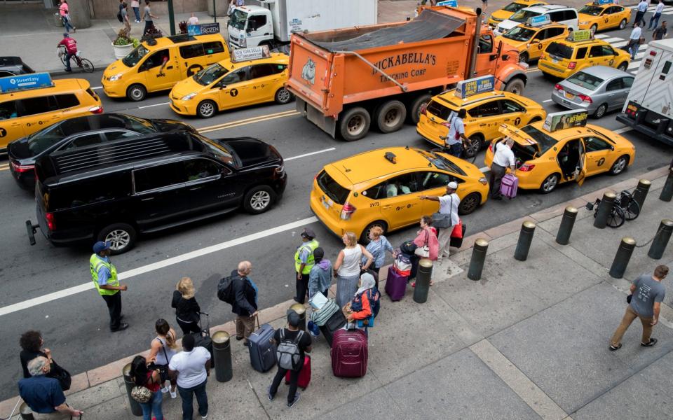 Uber New York yellow taxi - AP Photo/Mary Altaffer