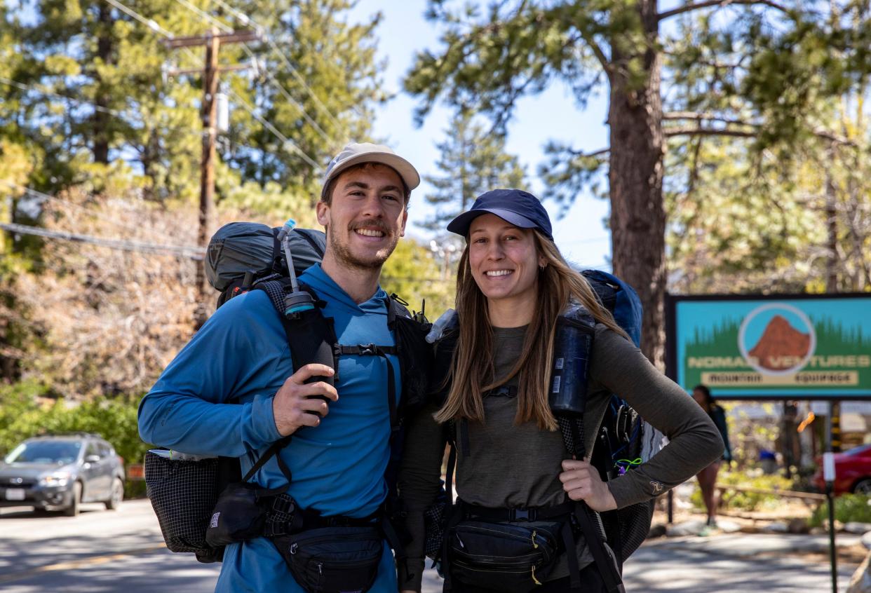 PCT hikers T.J. Trottier and Brayden Fracchia pose for a photo together before getting back on the trail in Idyllwild, Calif., Thursday, May 11, 2023.