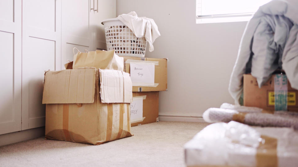 boxing boxes in a bedroom