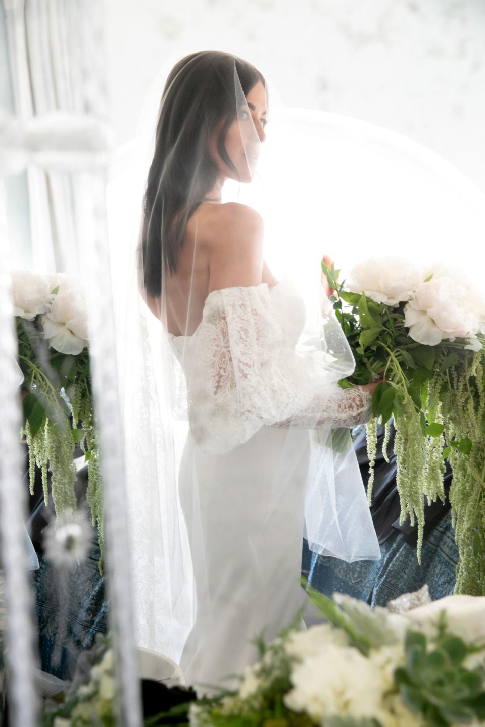 Holding my bouquet for the first time.