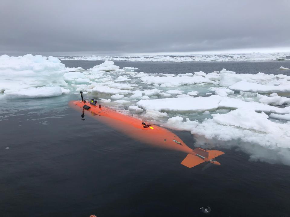 Rán, a Kongsberg HUGIN autonomous underwater vehicle, amongst sea ice in front of Thwaites Glacier, after a 20-hour mission mapping the seafloor.