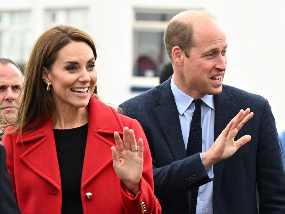 Kate Middleton and Prince William wave.