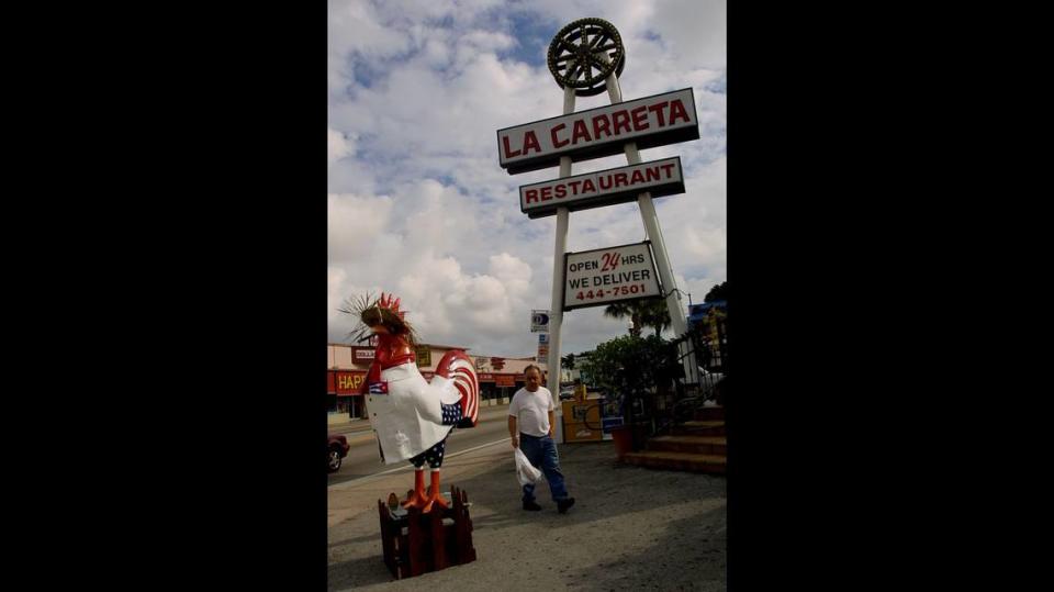 The rooster that was clad in a guayabera and straw hat in front of La Carreta, 3632 SW Eighth St., in 2002 was a López rooster.