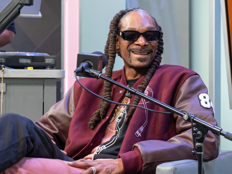 Snoop Dogg sits down with Roxanne Shante on SiriusXM's Rock The Bells Radio at The SiriusXM Studios on October 26, 2021 in New York City.