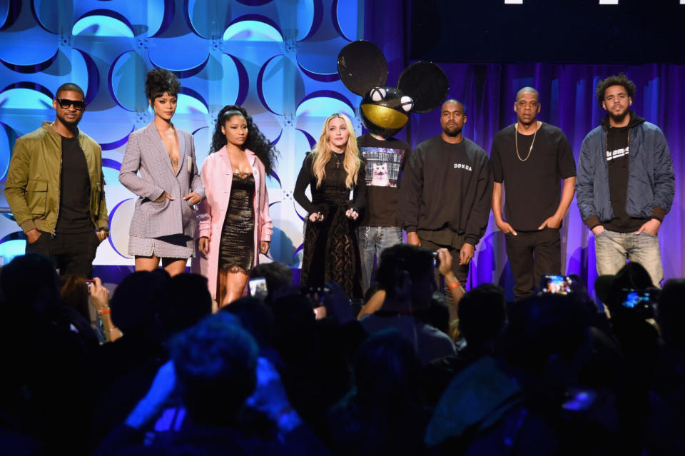 Usher, Rihanna, Nicki Minaj, Madonna, Deadmau5, Kanye West, Jay-Z, and J. Cole onstage at the Tidal launch event in 2015. (Photo credit: Jamie McCarthy/Getty Images for Roc Nation)