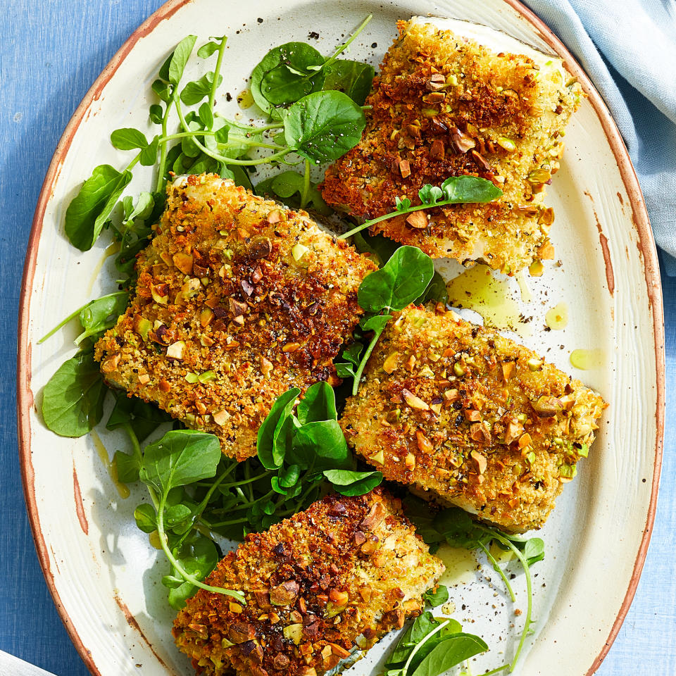 <p>Sea bass fillets are crusted in pistachios and panko for a nutty, crunchy exterior in this healthy air-fryer recipe. We use sea bass here, but any other firm white fish like halibut would work just as well. Serve with grains and a side salad. <a href="https://www.eatingwell.com/recipe/8012968/air-fryer-pistachio-crusted-sea-bass/" rel="nofollow noopener" target="_blank" data-ylk="slk:View Recipe;elm:context_link;itc:0;sec:content-canvas" class="link ">View Recipe</a></p>