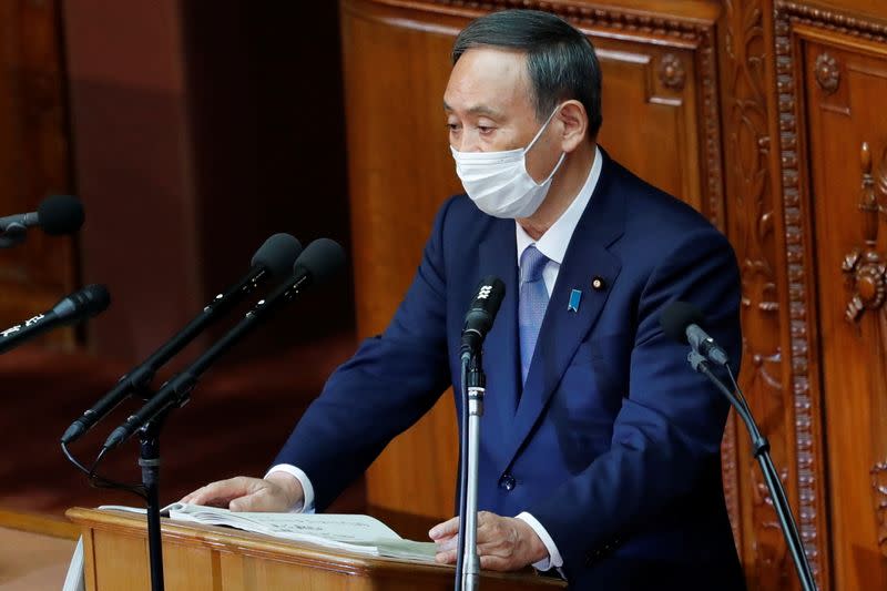 Japanese Prime Minister Yoshihide Suga gives his first policy speech in parliament in Tokyo