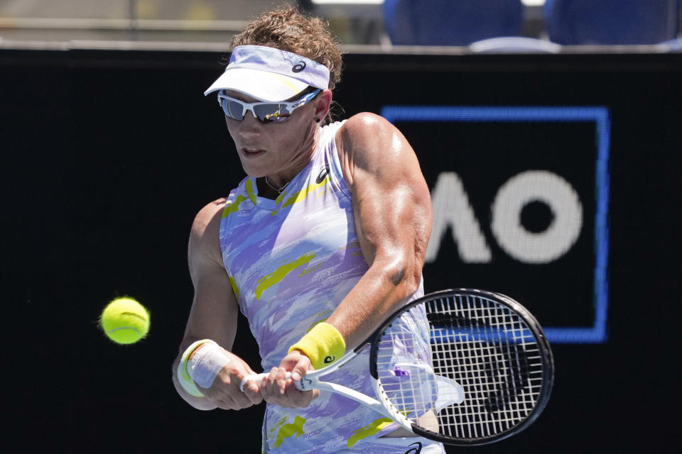 Samantha Stosur of Australia plays a backhand return to Anastasia Pavlyuchenkova of Russia during their second round match at the Australian Open tennis championships in Melbourne, Australia, Thursday, Jan. 20, 2022. (AP Photo/Simon Baker)