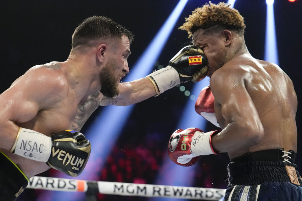 Devin Haney, right, fights Vasiliy Lomachenko in an undisputed lightweight championship boxing match Saturday, May 20, 2023, in Las Vegas. Haney won by unanimous decision. (AP Photo/John Locher)