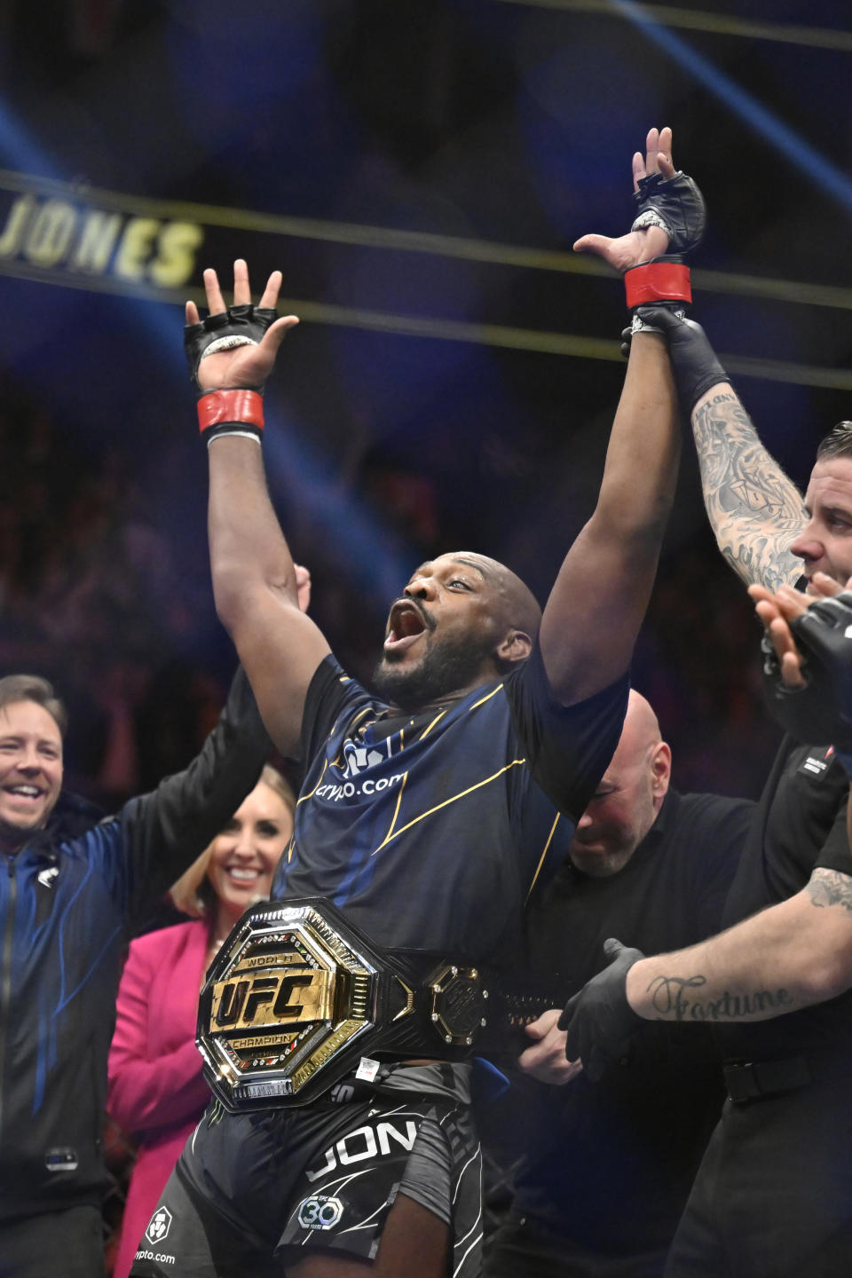 Jon Jones celebrates after defeating Ciryl Gane in a UFC 285 mixed martial arts heavyweight title bout Saturday, March 4, 2023, in Las Vegas. (AP Photo/David Becker)