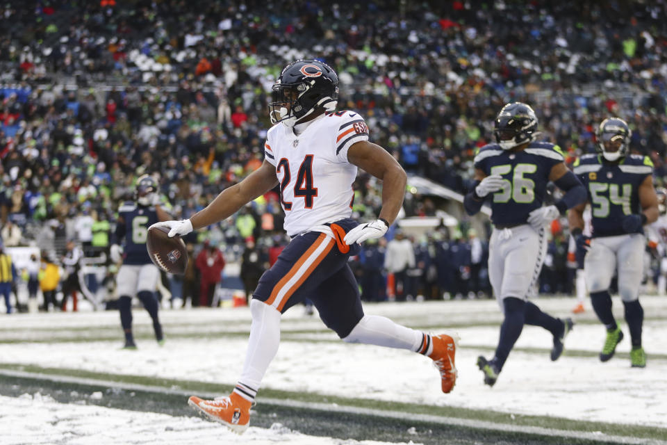 Chicago Bears running back Khalil Herbert scores a touchdown on a 20-yard run against the Seattle Seahawks during the second half of an NFL football game, Sunday, Dec. 26, 2021, in Seattle. (AP Photo/Lindsey Wasson)