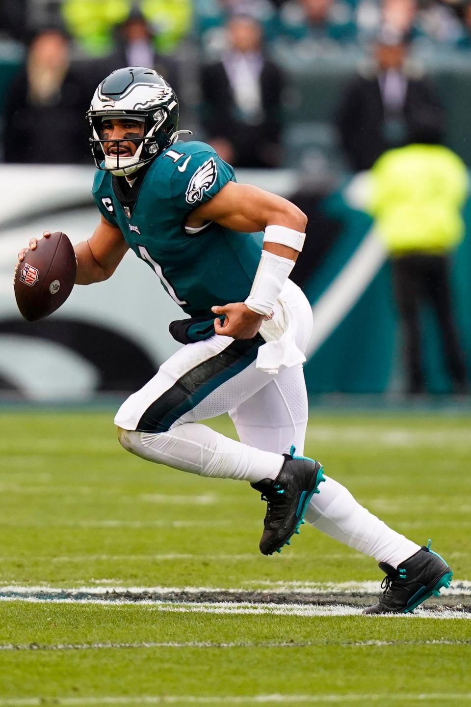 Philadelphia Eagles quarterback Jalen Hurts looks to pass against the San Francisco 49ers during the first half of the NFC Championship NFL football game between the Philadelphia Eagles and the San Francisco 49ers on Sunday, Jan. 29, 2023, in Philadelphia.