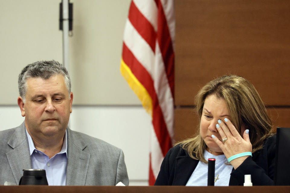 Jennifer Montalto, with her husband, Tony, left, gives her victim impact statement during the penalty phase of the trial of Marjory Stoneman Douglas High School shooter Nikolas Cruz at the Broward County Courthouse in Fort Lauderdale, Fla., Wednesday, Aug. 3, 2022. The Montalto's daughter, Gina, was killed in the 2018 shootings. Cruz previously plead guilty to all 17 counts of premeditated murder and 17 counts of attempted murder in the 2018 shootings. (Amy Beth Bennett/South Florida Sun Sentinel via AP, Pool)