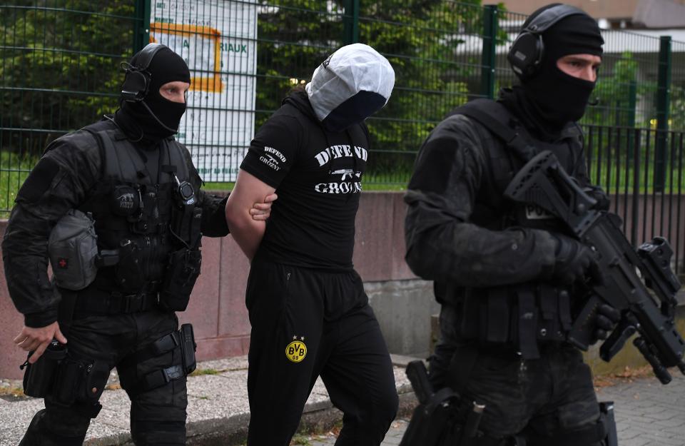 <p>French policemen arrest a man in Strasbourg, on May 13, 2018, suspected to be related to a knifeman who killed the day before one man and wounded four other people in Paris. (Photo: Patrick Hertzog/ AFP/Getty Images) </p>