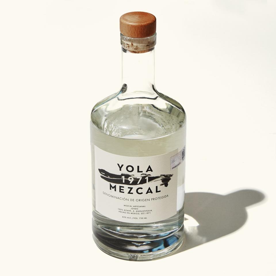 A bottle of Yola mezcal, ready to be opened.