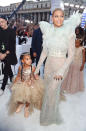 <p>Beyoncé, who confirmed at the last minute that she’s performing, chose a look from Francesco Scognamiglio’s Fall 2016 couture collection covered in sequins and featuring feather wings. She brought along daughter Blue Ivy, wearing a shiny top and massive tutu skirt with pink sneakers and hair extensions, as her date, and both looked like fairies from a far-off fashionable land. <i>(Photo: Getty Images)</i></p>