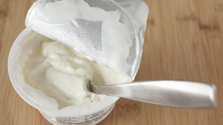 Greek yogurt container with spoon