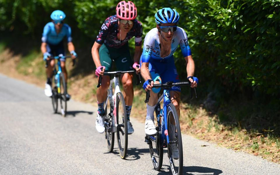 Simon Yates rides on the front ahead of Simon Yates, while Harold Tejada chases on - GETTY IMAGES