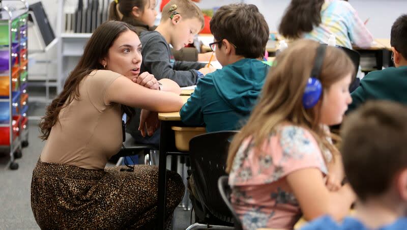 Third grade teacher Nereida Lopez talks to one of her students before The Great Utah ShakeOut earthquake drill at Heartland Elementary School in West Jordan on Thursday, April 18, 2024.