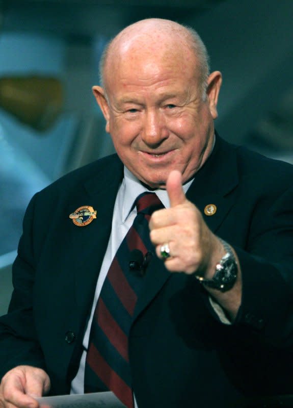 Cosmonaut Alexey A. Leonov, the first man to walk in space, gives a thumbs-up to the crowd at the 30th anniversary reunion program of the Apollo-Soyuz mission at the National Air and Space Museum in Washington, D.C., on July 14, 2005. On March 18, 1965, Leonov became the first person to walk in space. File Photo by Kevin Dietsch/UPI