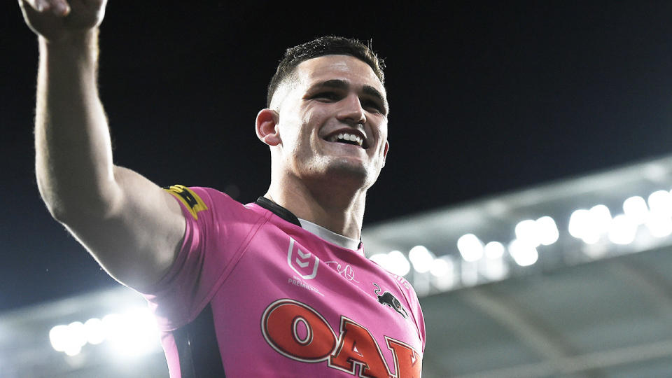 Nathan Cleary waves to fans after a game.