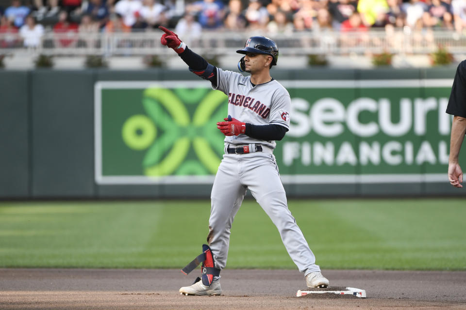 Cleveland Guardians' Andres Gimenez celebrates after hitting a double against Minnesota Twins pitcher Sonny Gray during the fourth inning of a baseball game, Saturday, June 3, 2023, in Minneapolis. (AP Photo/Craig Lassig)