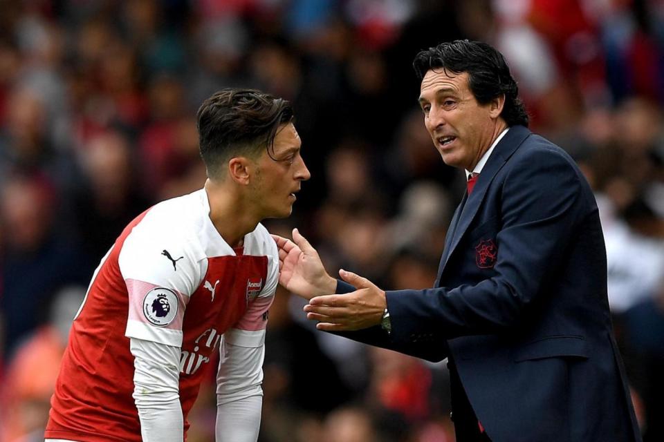 Message of support: new Arsenal boss Unai Emery backed Mesut Ozil when he returned from the World Cup (Getty Images)