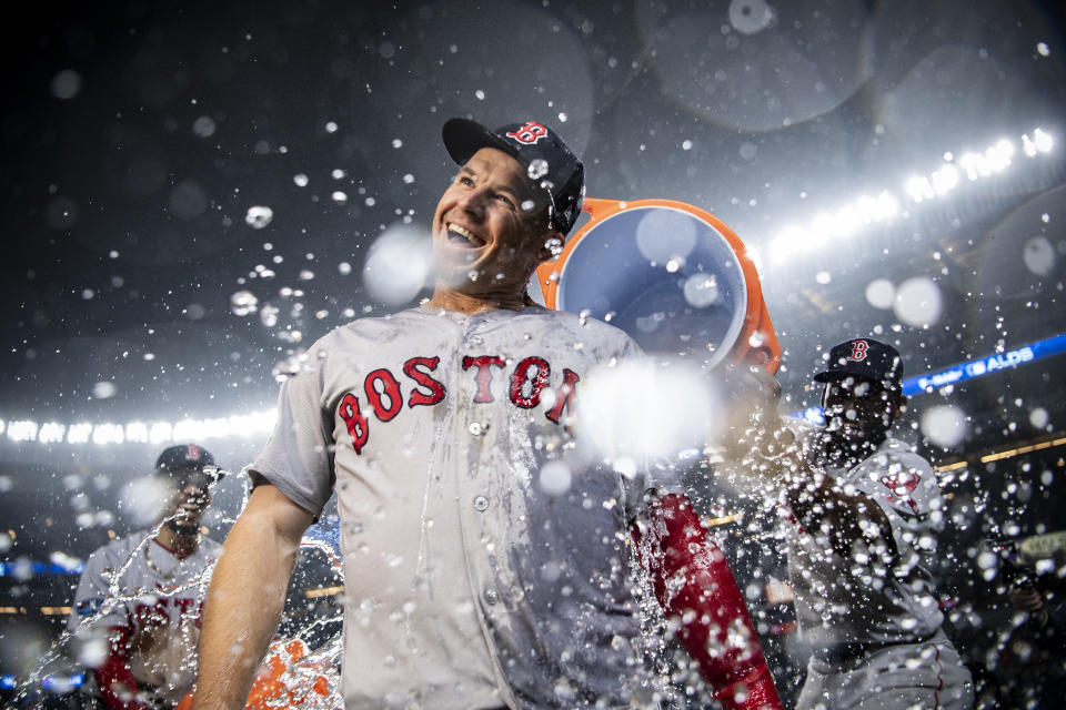 <p>NEW YORK, NY – OCTOBER 8: Brock Holt #12 of the Boston Red Sox is doused with Gatorade after hitting for the cycle after game three of the American League Division Series against the New York Yankees on October 8, 2018 at Yankee Stadium in the Bronx borough of New York City. (Photo by Billie Weiss/Boston Red Sox/Getty Images) *** Local Caption *** Brock Holt </p>