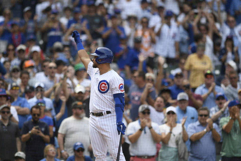 Chicago Cubs' Willson Contreras waves to the crowd after receiving a standing ovation while batting during the seventh inning of a baseball game against the Pittsburgh Pirates Tuesday, July 26, 2022, in Chicago. Chicago won 4-2. (AP Photo/Paul Beaty)