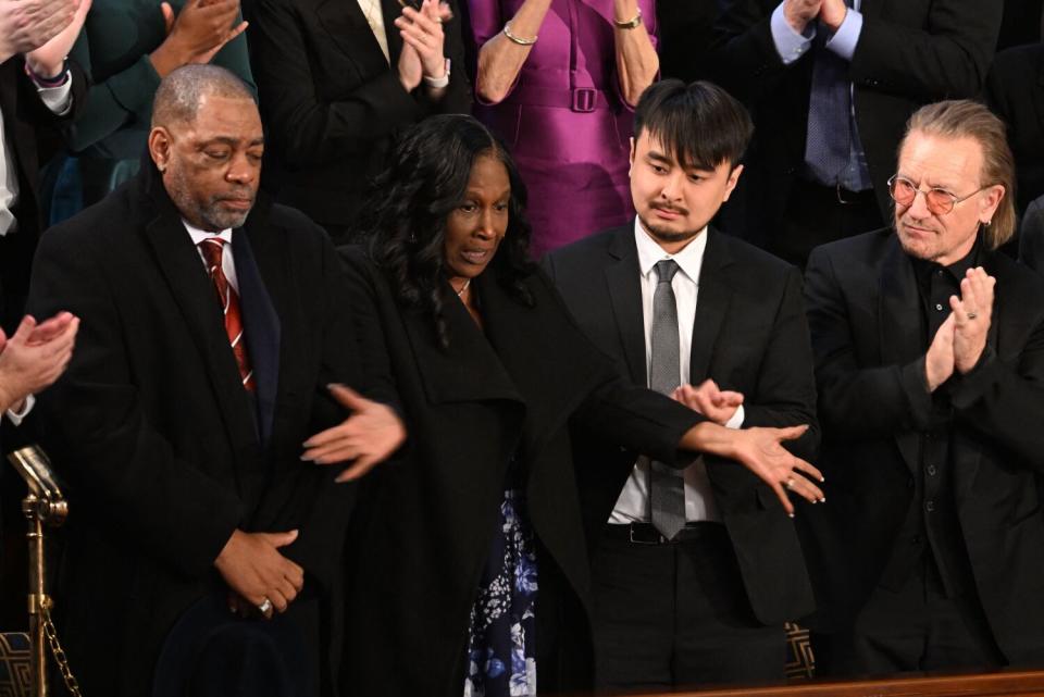 Rodney Wells, left and RowVaughn Wells, parents of Tyre Nichols, with Brandon Tsay, hero of the Monterey, Calif., shooting