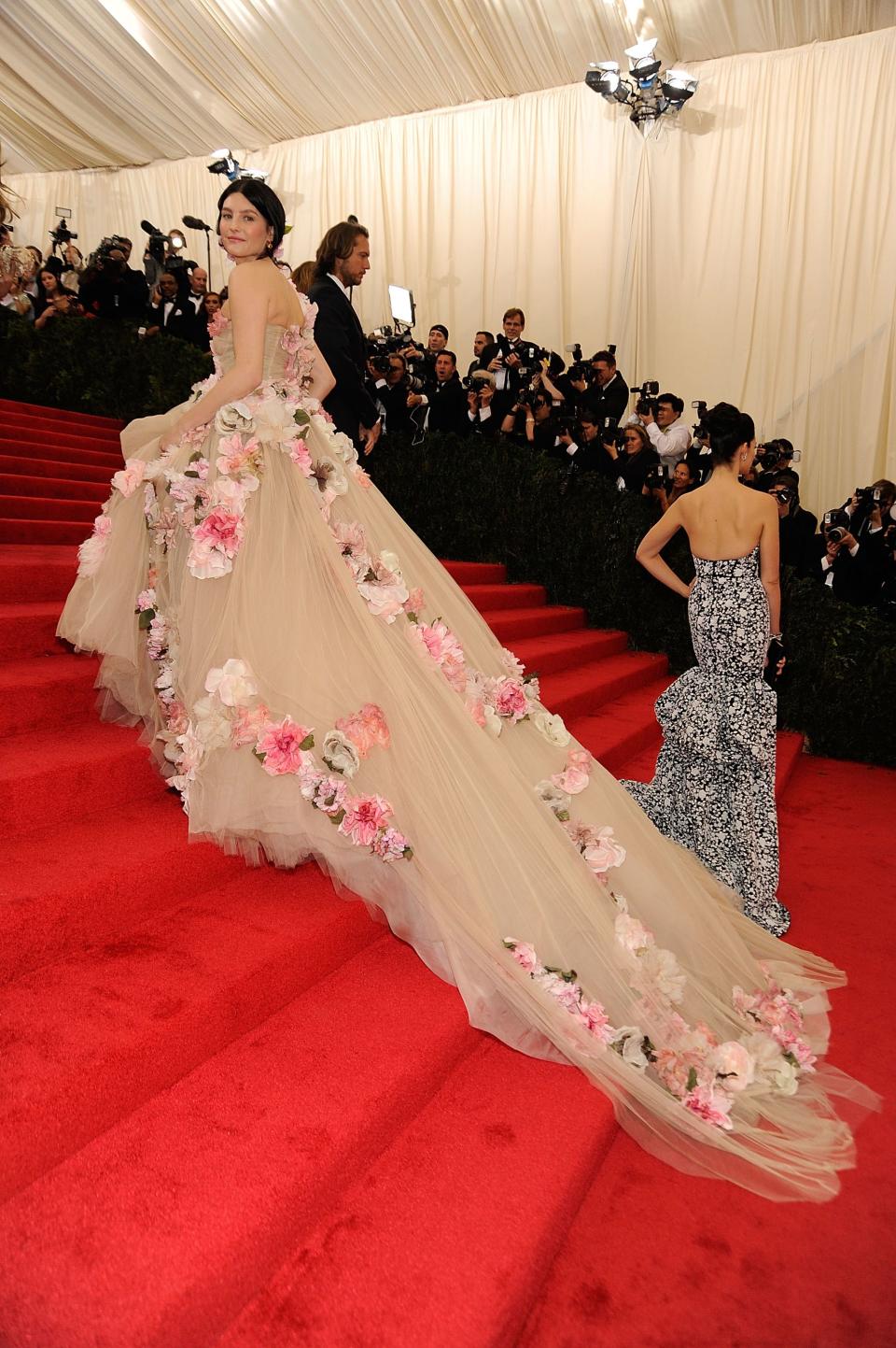 There’s no shortage of exquisite ways to wear a train at the Met Gala and we've rounded up our favorite looks.