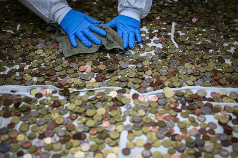 The Wider Image: What happens to the coins tossed into Rome's Trevi Fountain?