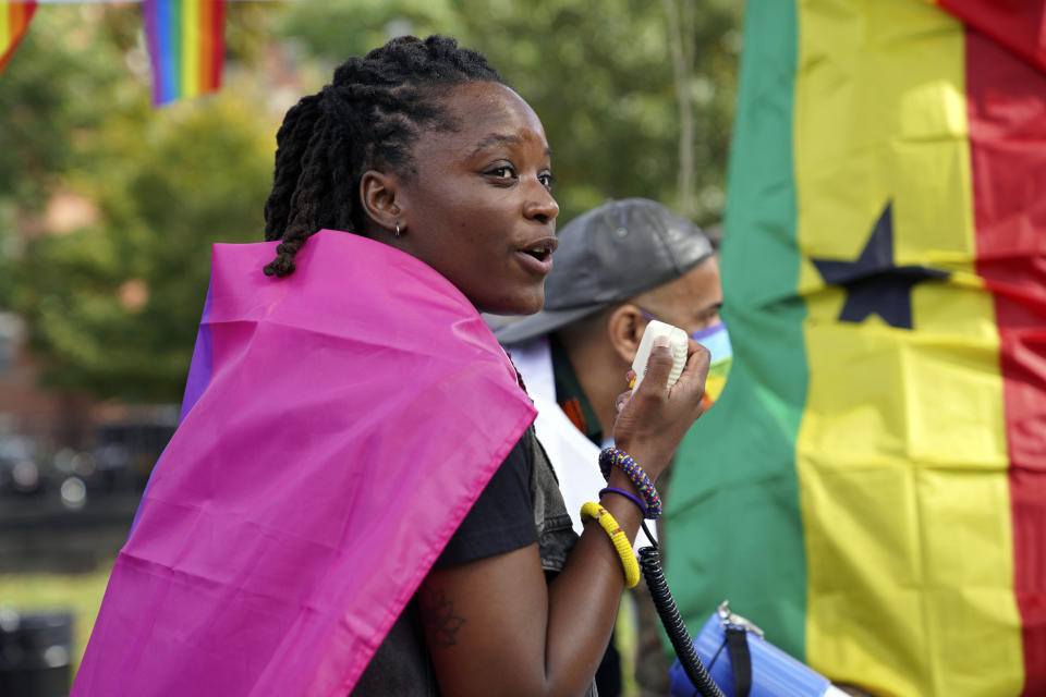 Ghanian activist Abena Hutchful leads a rally against a controversial bill being proposed in Ghana's parliament that would make identifying as LGBTQIA or an ally a criminal offense punishable by up to 10 years in prison, in the Harlem neighborhood of New York on Monday, Oct 11, 2021. The bill has received strong support from the country's most influencial clergy, including the Catholic Bishops' Conference. (AP Photo/Emily Leshner)