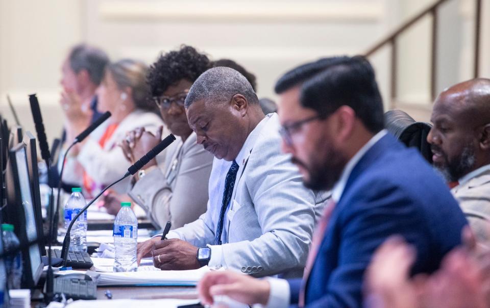 City Council President CC Calhoun, center, presides during a city council meeting at Montgomery City Hall in Montgomery, Ala., on Tuesday, April 16, 2024.