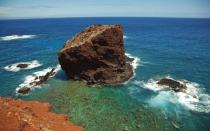 <p>For star-crossed lovers, Hawaiis Sweetheart Rock may be an appropriate romantic venue. According to local lore, there was once a man who was so taken with his new wifes beauty that he was afraid to let other men see her. So he confined her to a sea cave near the rock. One day, a giant storm began to pound the island. The man raced back to where his wife was to save her but by the time he arrived, she had already drowned. He threw himself off a nearby rock in grief and despair. Pray that your own love story has a happier ending. </p>