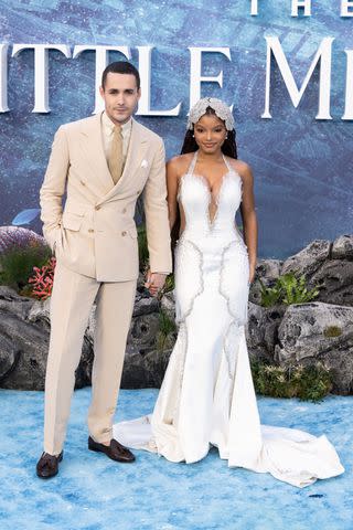 <p>Jeff Spicer/Getty </p> Jonah Hauer-King and Halle Bailey photographed at the U.K. premiere of 'The Little Mermaid.'