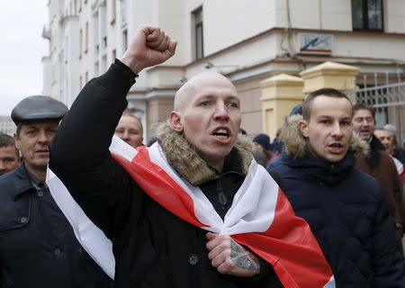 People shout slogans as they take part in an opposition rally on the eve of presidential election in Minsk, Belarus, October 10, 2015. REUTERS/Vasily Fedosenko