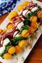 <p>The classic sweet and salty combination of cantaloupe and prosciutto will never go out of style.</p><p>Get the recipe from <a href="https://www.delish.com/cooking/recipe-ideas/recipes/a53065/melon-prosciutto-skewers-recipe/" rel="nofollow noopener" target="_blank" data-ylk="slk:Delish;elm:context_link;itc:0;sec:content-canvas" class="link ">Delish</a>.</p>