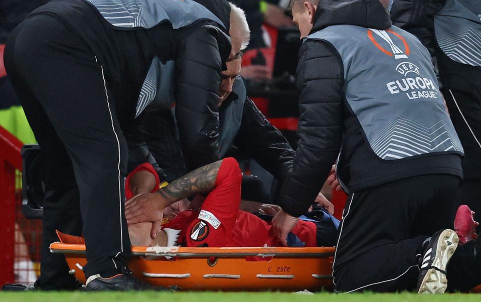 Martinez goes off injured - AFP/Darren Staples
