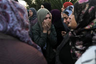 Relatives and friends react as the coffin carrying the body of Aiia Maasarwe, 21, an Israeli student killed in Melbourne, arrives before her funeral in her home town of Baqa Al-Gharbiyye, northern Israel January 23, 2019. REUTERS/Ammar Awad