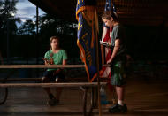 <p>Brody Nations, 13, of St. Louis, reads some of the 36,574 people who died in the Korean War as his sister Carleigh Nations, 11, rings a bell for each name read at Sylvan Springs County Park on Friday, May 25, 2018. (Photo: Robert Cohen/St. Louis Post-Dispatch via AP) </p>