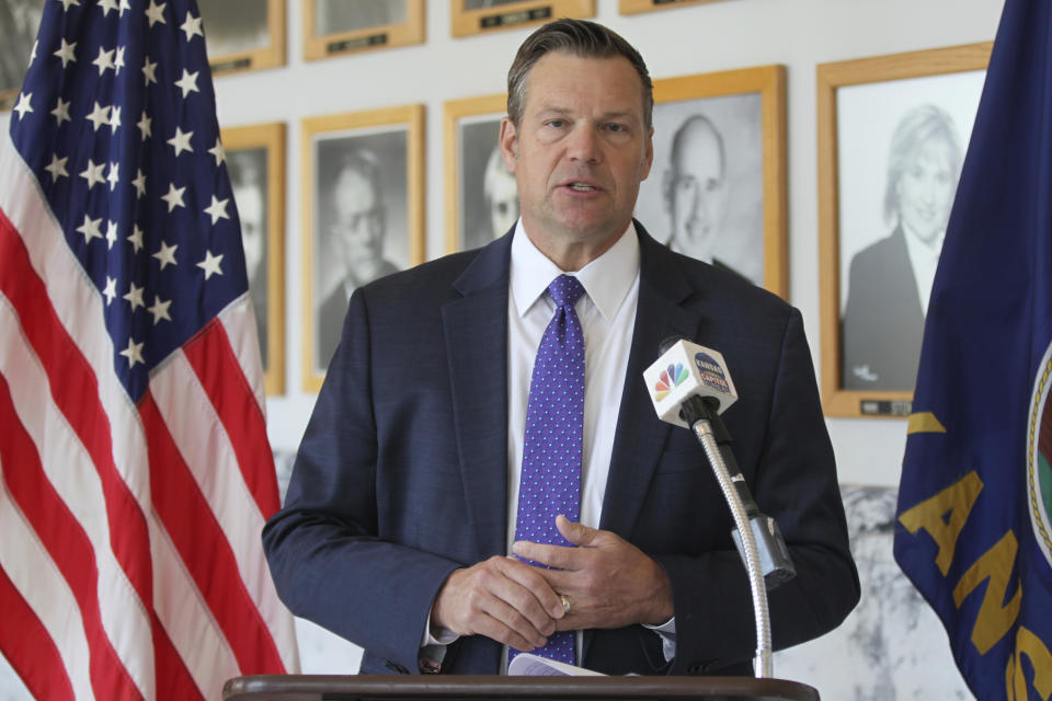 FILE - Kansas Attorney General Kris Kobach answers questions from reporters during a news conference outside his office, Monday, May 1, 2023, in Topeka, Kan. Kansas will no longer change transgender people's birth certificates to reflect their gender identities, the state health department said Friday, Sept. 15, 2023, citing a new law that prevents the state from legally recognizing those identities. (AP Photo/John Hanna, File)