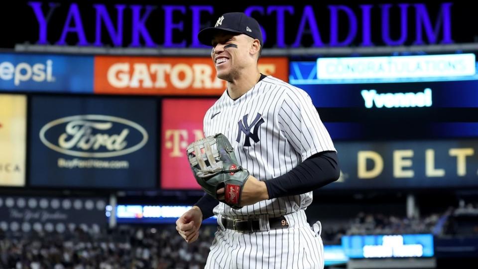 Sep 30, 2022;  Bronx, New York, USA;  New York Yankees right fielder Aaron Judge (99) reacts as he runs in from the outfield during the fifth inning against the Baltimore Orioles at Yankee Stadium.