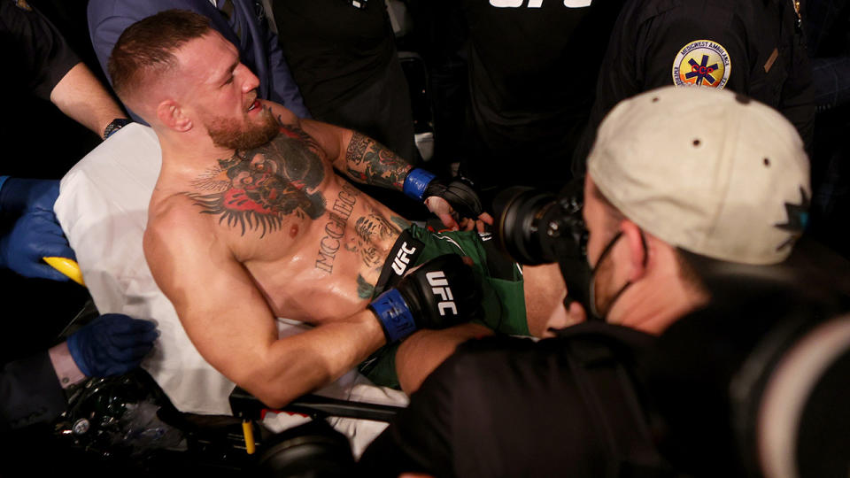 Conor McGregor was taken from the UFC 264 ring on a stretcher after breaking his ankle against Dustin Poirier. (Photo by Stacy Revere/Getty Images)