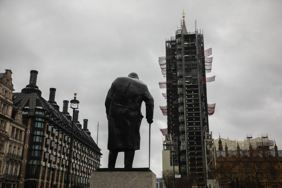 Statue of Winston Churchill at Parliament Square and a view on Big Ben being repaired in London, United Kingdom on 10 December, 2019. UK General Election will be held on 12 December, 2019.  (Photo by Beata Zawrzel/NurPhoto via Getty Images)